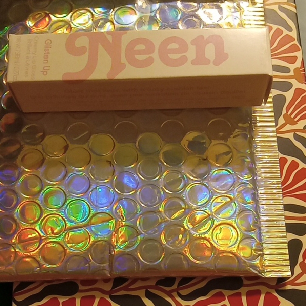 Neen Glisten Creamy Lip Gloss in shade - bye
